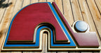 Wooden Nordique logo in 3D, painted in red, blue, and white