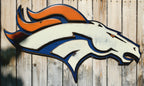 Denver Broncos modern logo displayed on a wooden fence